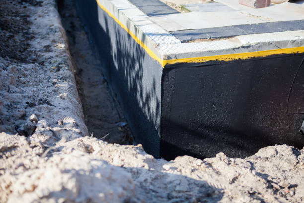 Professional Waterproofing technician working in Holmes, PA